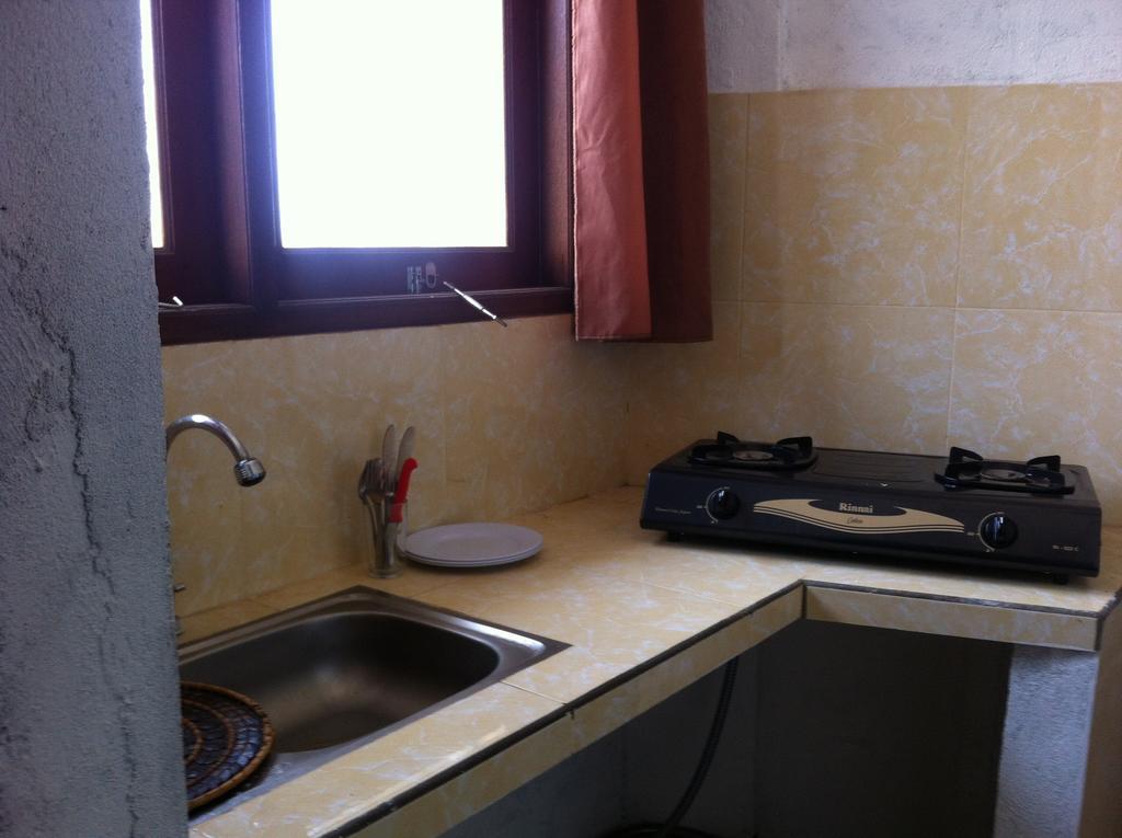 Amed Sari Beach Guesthouse Rom bilde